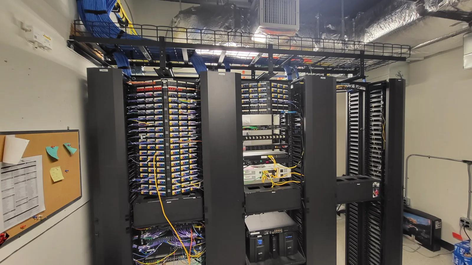 Four-rack server room with structured cabling installed by KConnect Tech